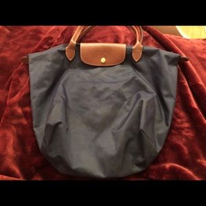 Slightly used navy long champ purse